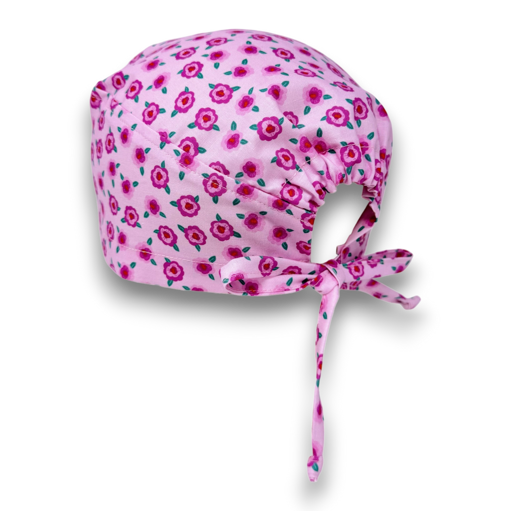 Pink Floral Skull tie-back style surgical scrub cap by Paradise Caps.