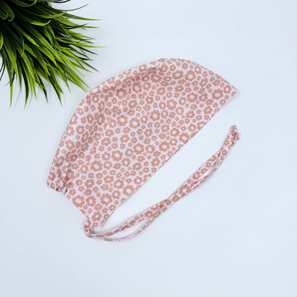 Pearl Flower Skull tie-back style surgical scrub cap by Paradise Caps.