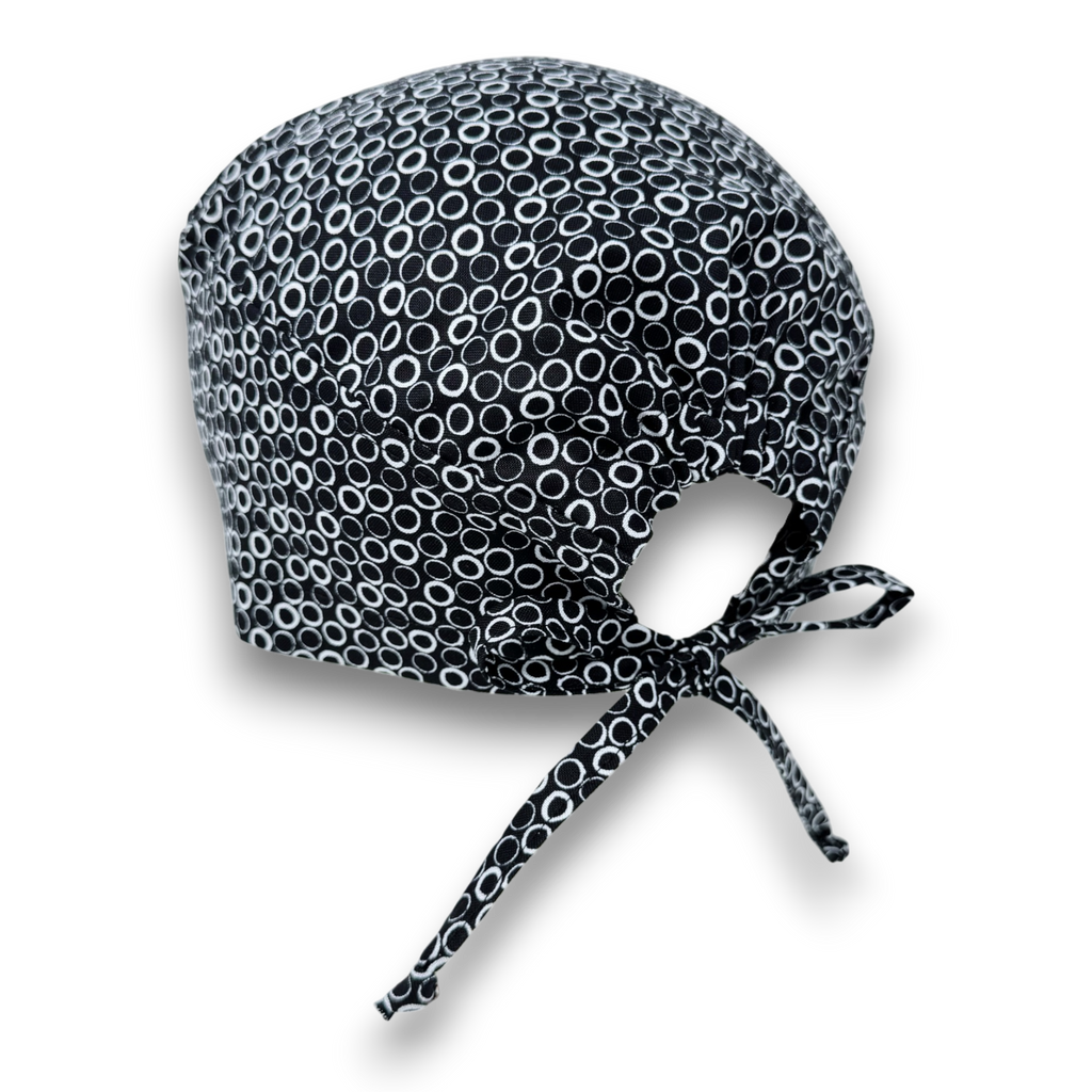 Black Circle Skull tie-back style surgical scrub cap for men by Paradise Caps.