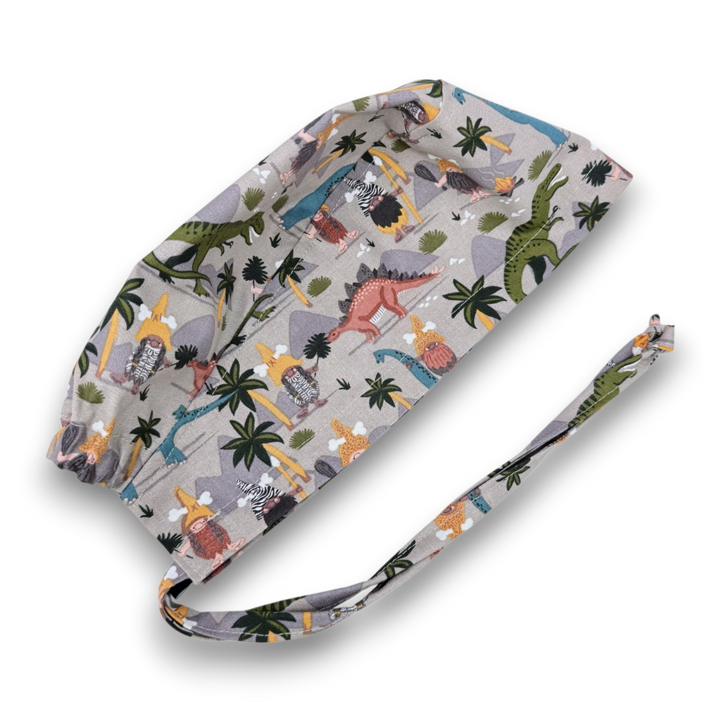 Men's surgical scrub cap. Safari Dino skull tie-back style scrub cap by Paradise Caps.