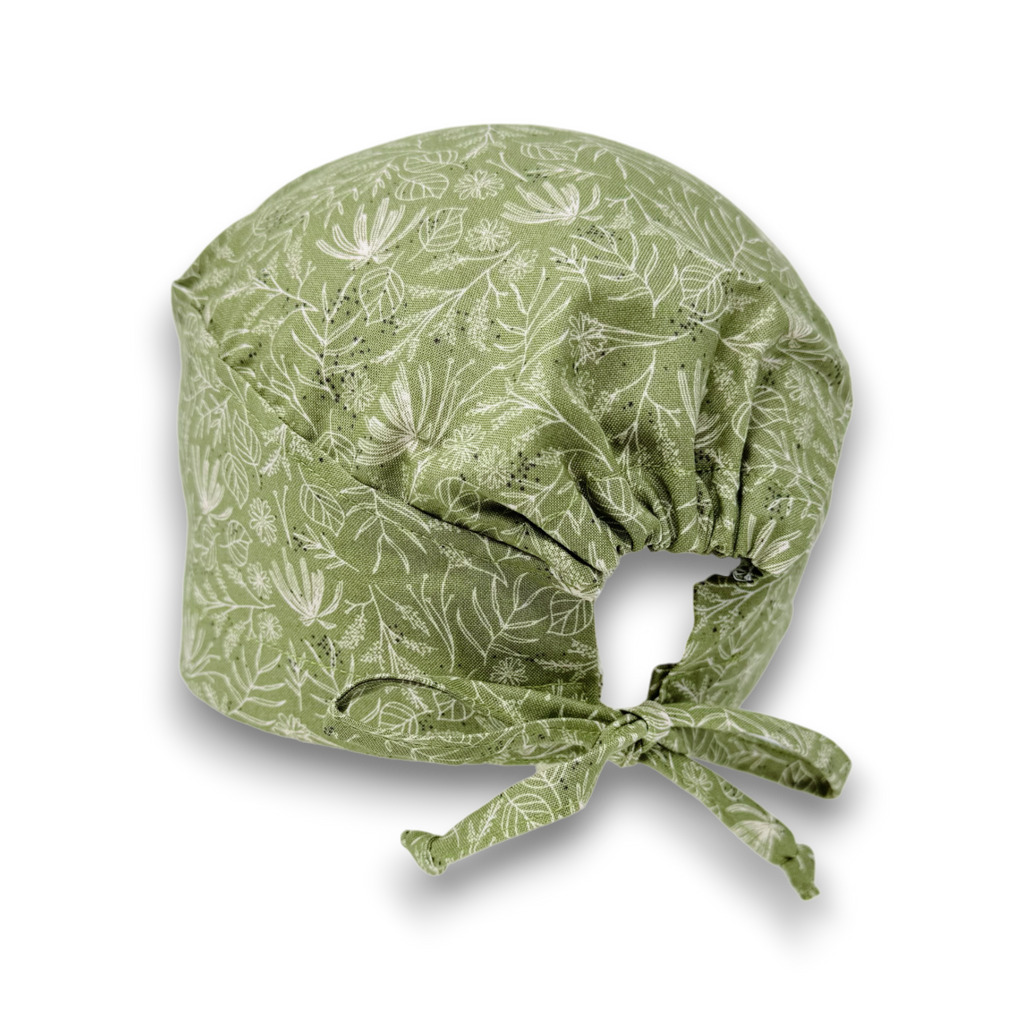 Green Floral Skull tie-back style surgical scrub cap for men by Paradise Caps.