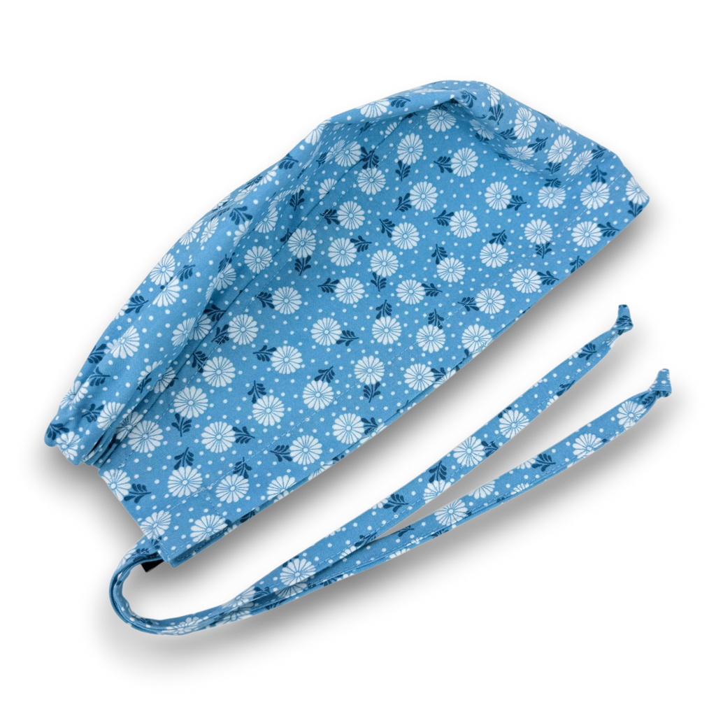 Surgical scrub hat. Daisy print Skull tie-back style surgical scrub cap by Paradise Caps.