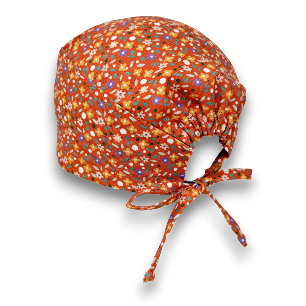 Ditsy Flower Skull tie-back style surgical scrub cap for men by Paradise Caps.