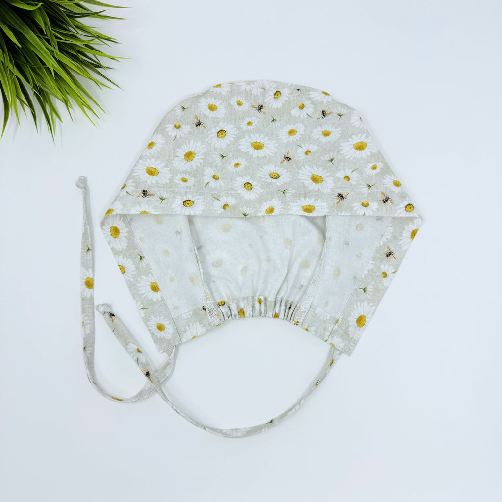 Bee And Daisy Skull tie-back style surgical scrub cap for men by Paradise Caps.