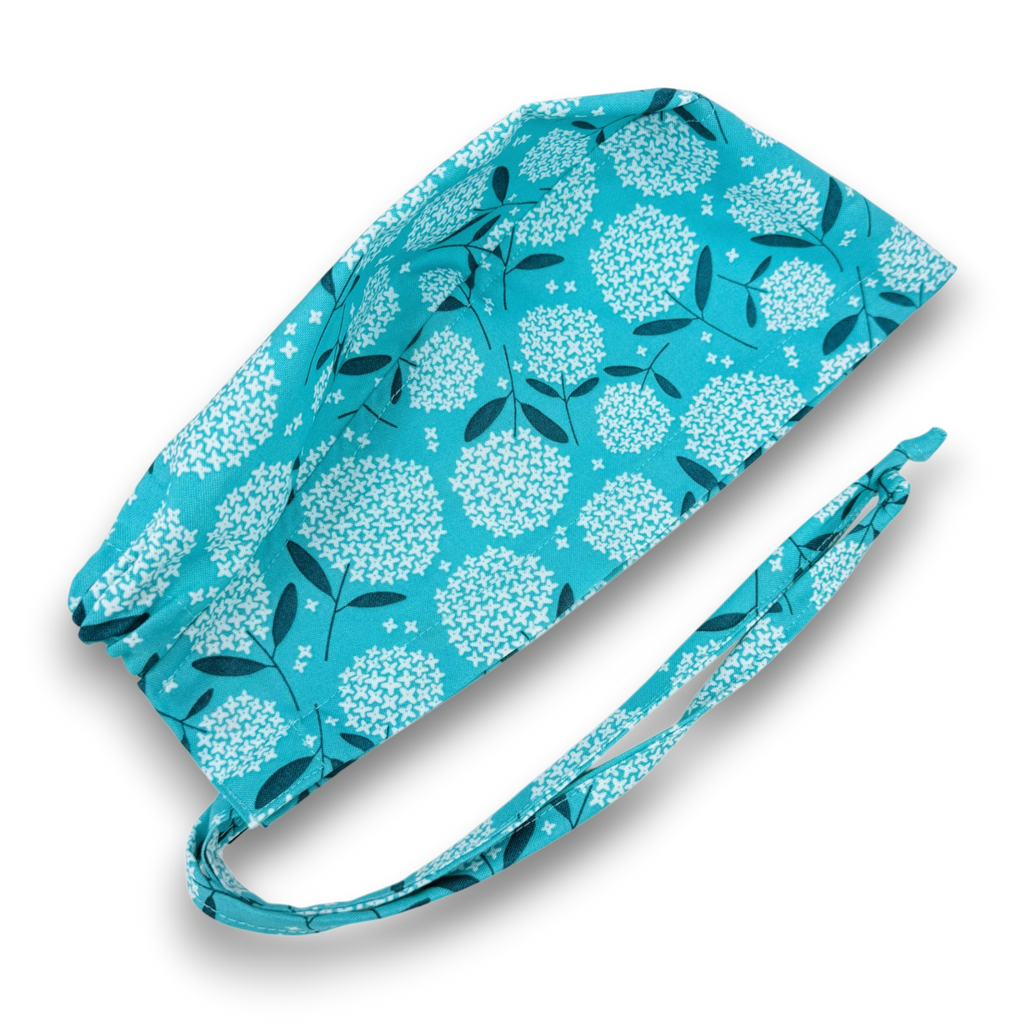 Surgical scrub hat. Teal hydrangea Skull tie-back style surgical scrub cap by Paradise Caps.