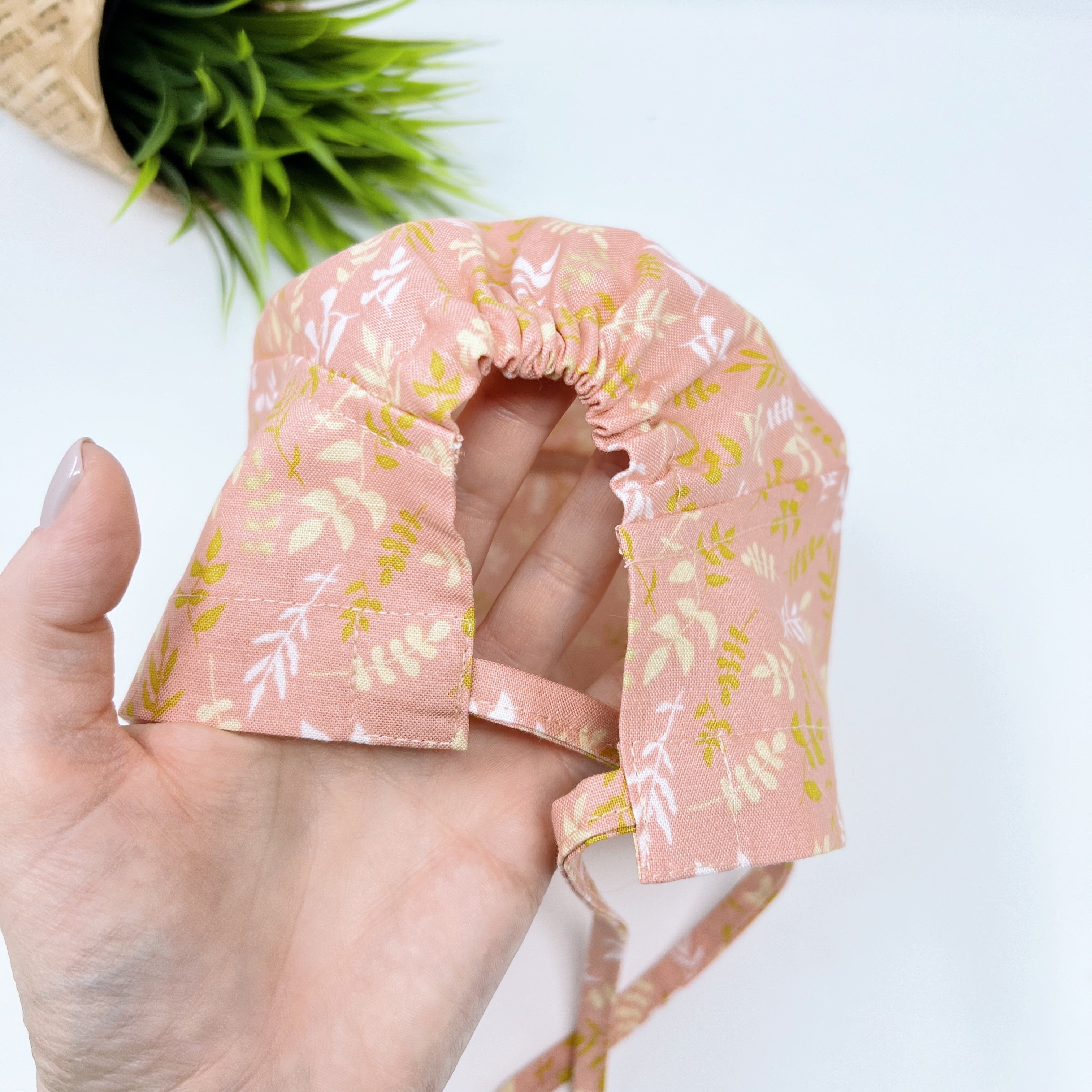 Coral leaves Skull tie-back style surgical scrub cap by Paradise Caps.
