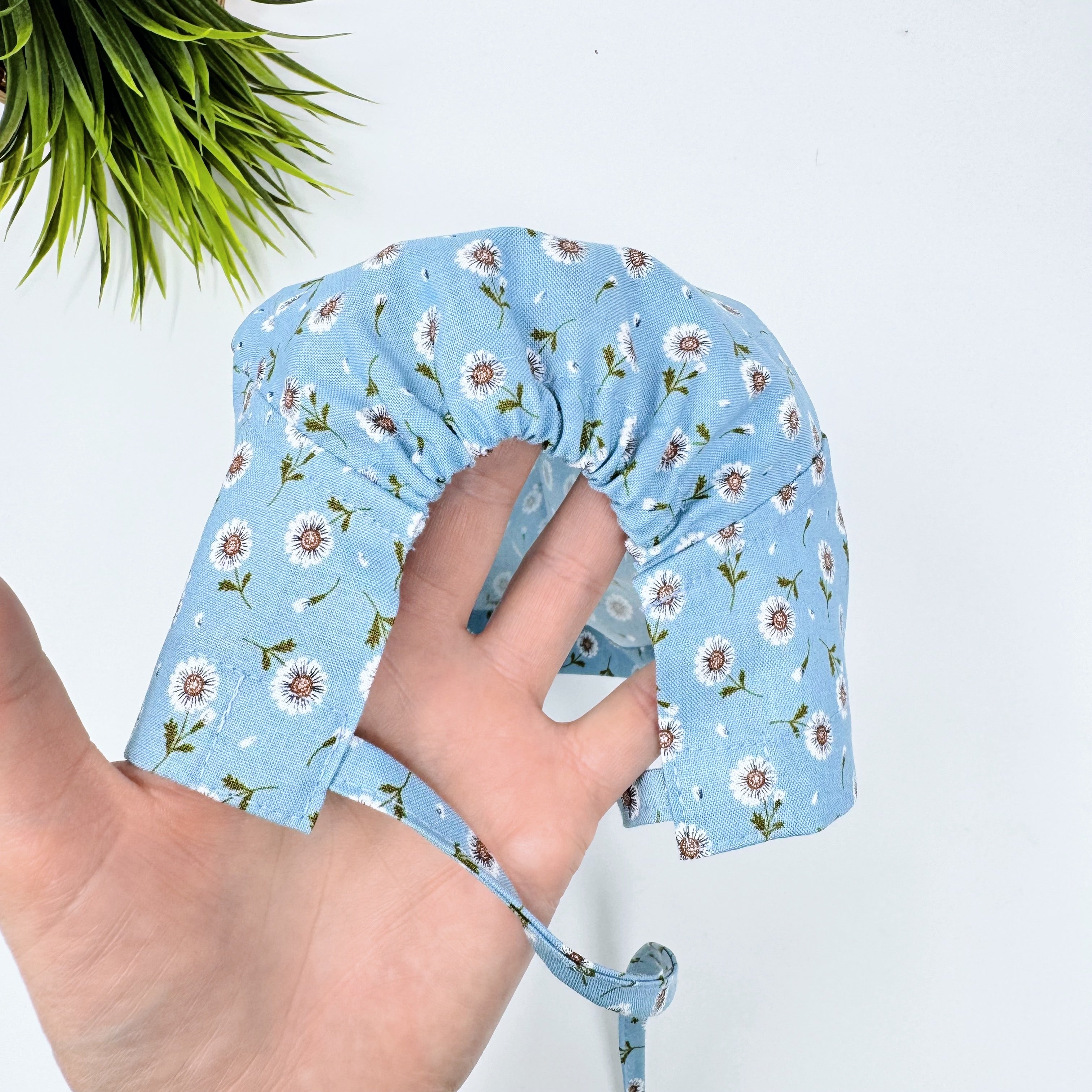 Tossed Daises Skull tie-back style surgical scrub cap for men by Paradise Caps.