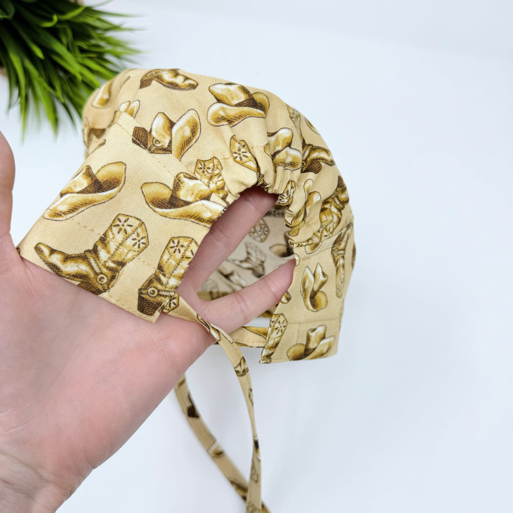 Cowboys Skull tie-back style surgical scrub cap for men by Paradise Caps.