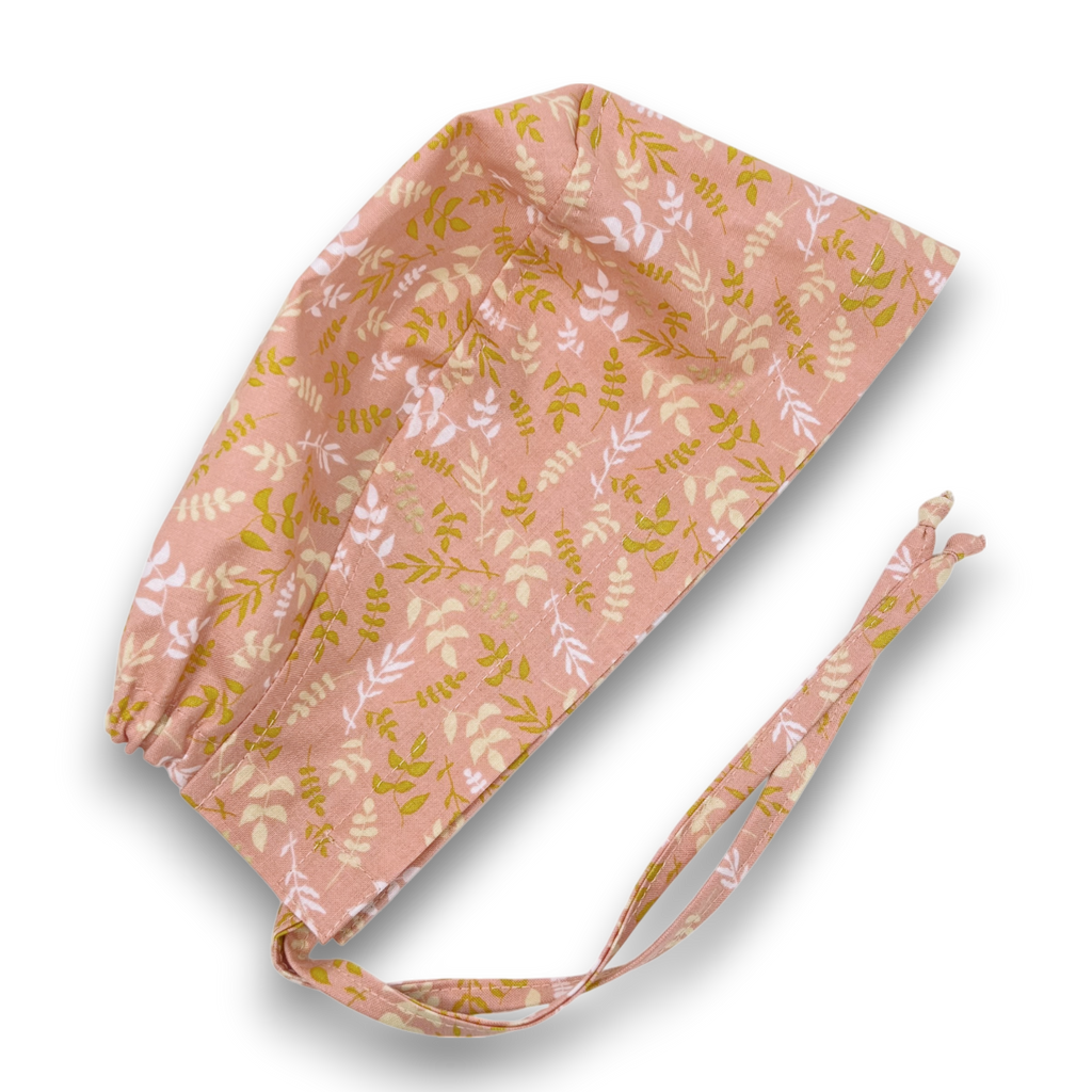 Coral leaves Skull tie-back style surgical scrub cap by Paradise Caps.