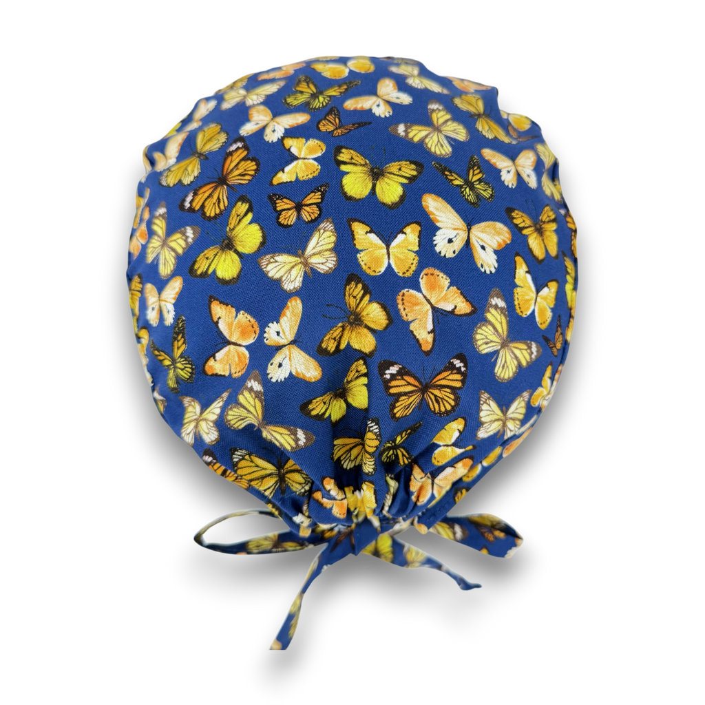 Yellow Butterfly Skull tie-back style surgical scrub cap for men by Paradise Caps.