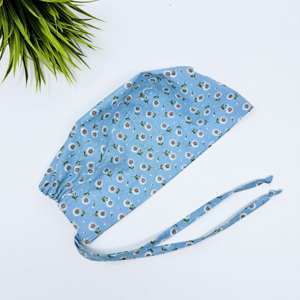 Tossed Daises Skull tie-back style surgical scrub cap for men by Paradise Caps.
