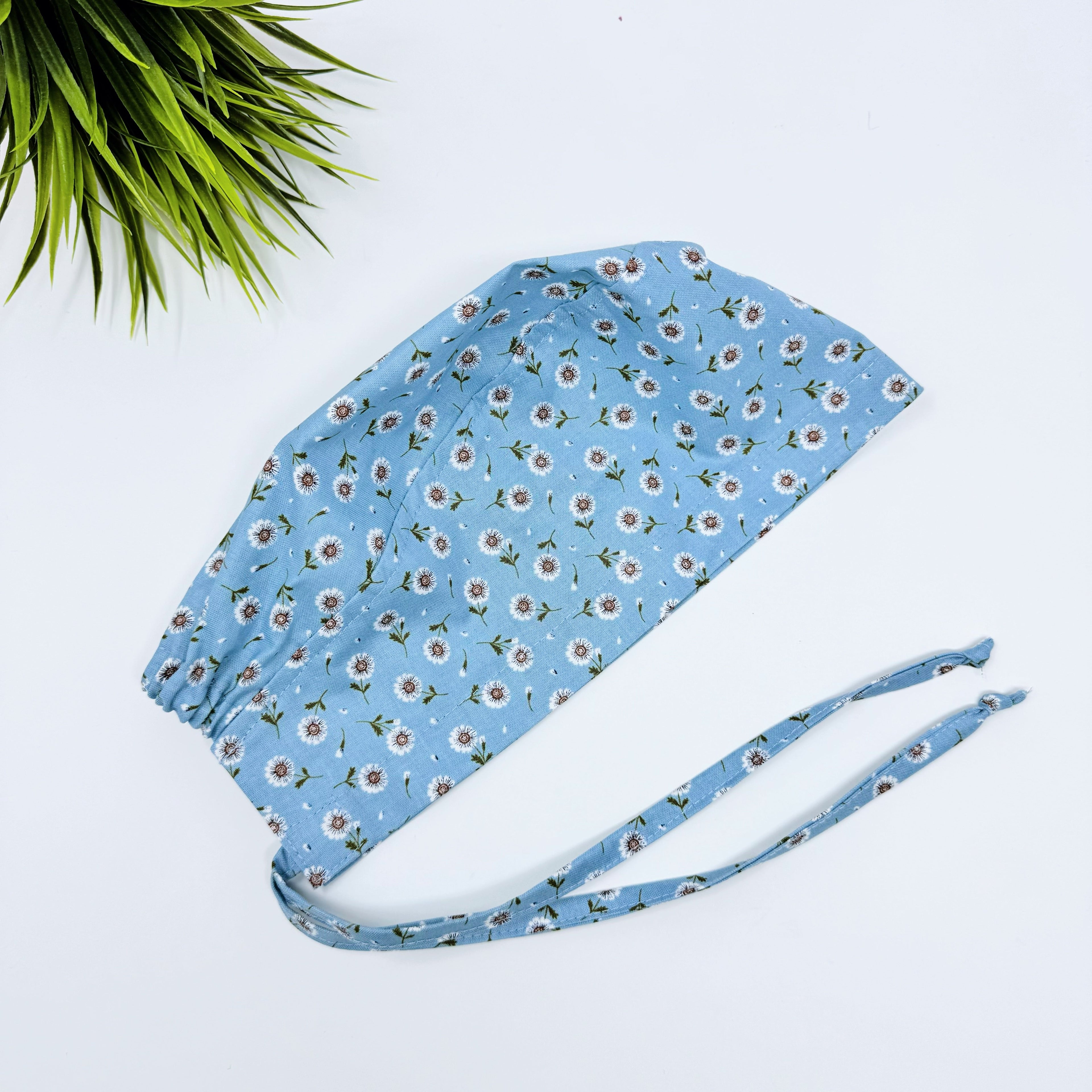 Tossed Daises Skull tie-back style surgical scrub cap for men by Paradise Caps.