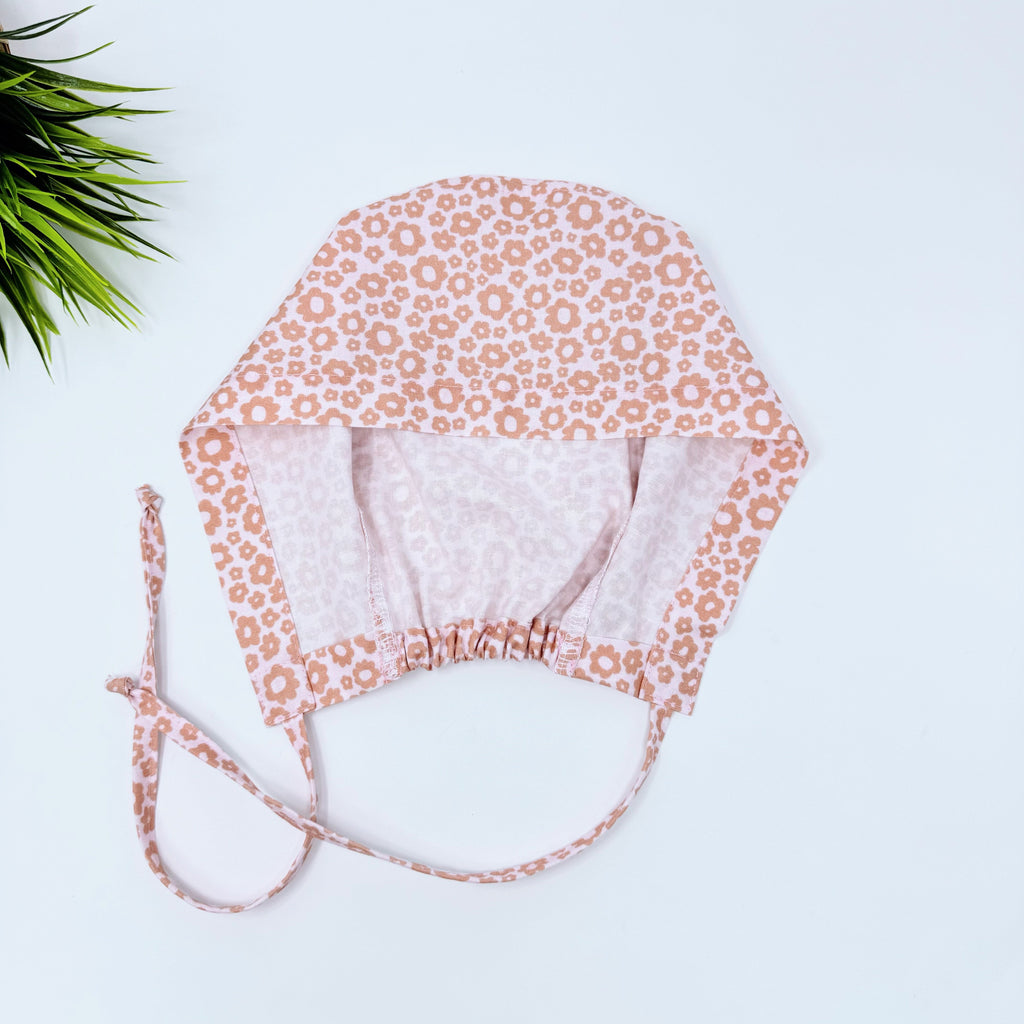 Pearl Flower Skull tie-back style surgical scrub cap by Paradise Caps.