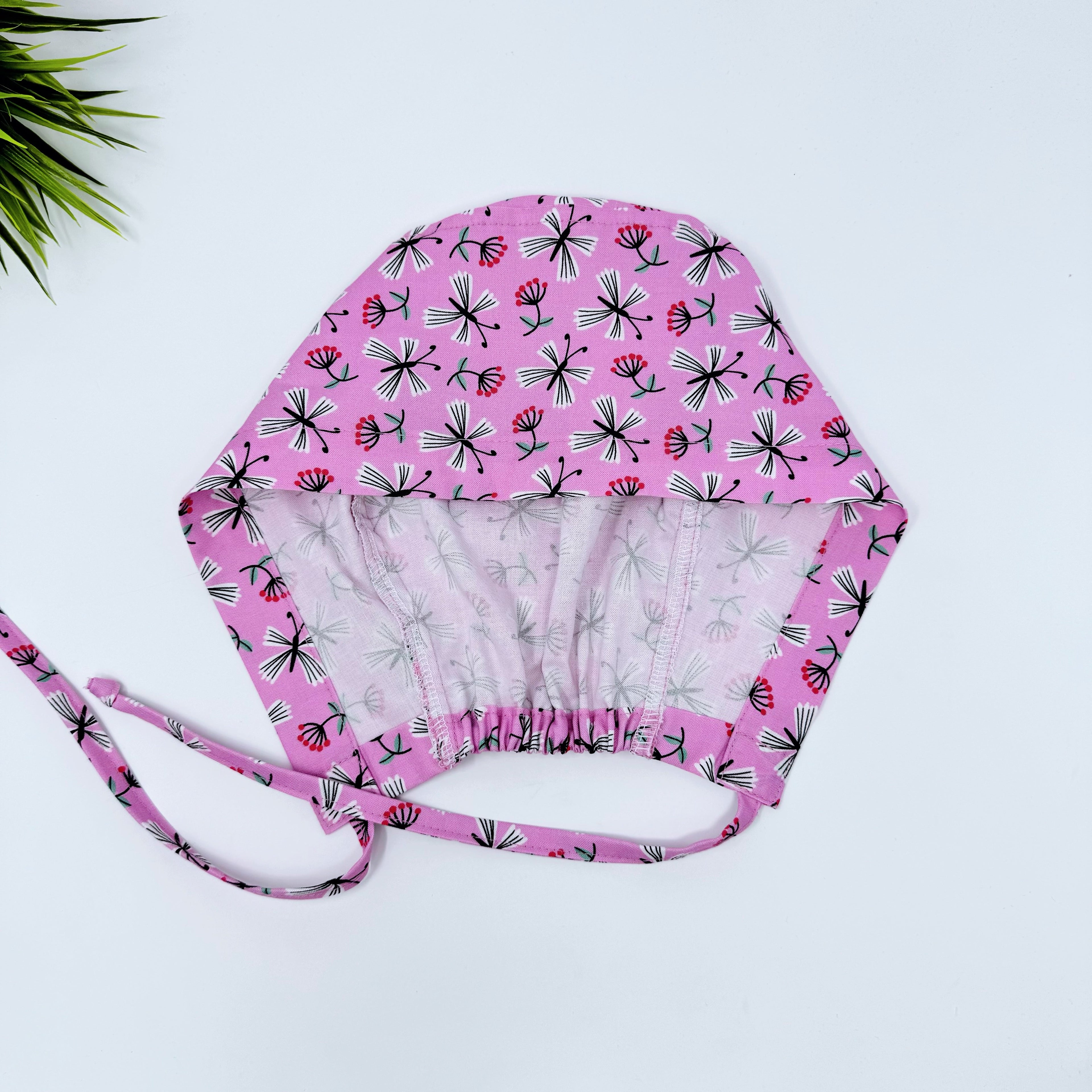 Charmingly Cheerful Skull tie-back style surgical scrub cap for men by Paradise Caps.