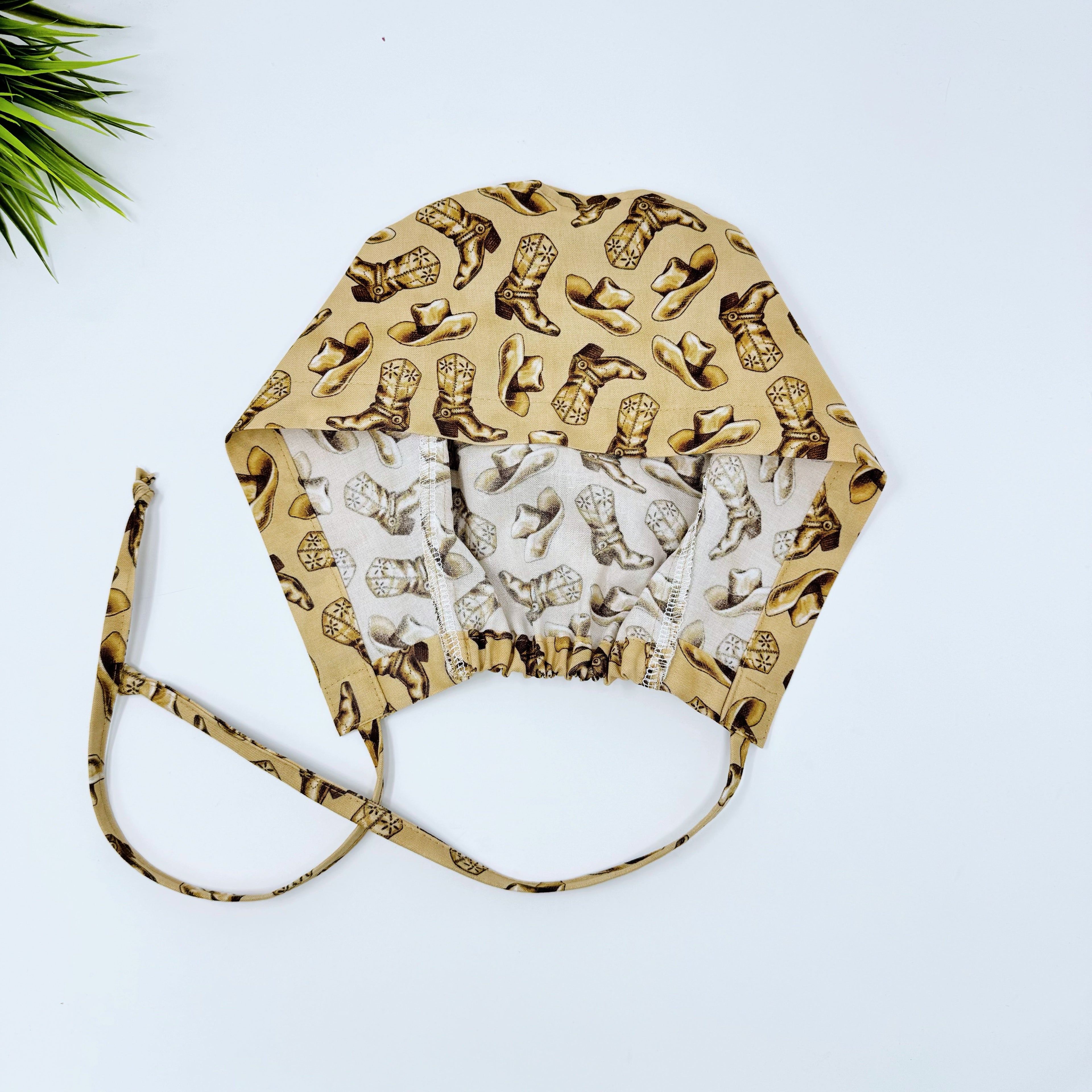 Cowboys Skull tie-back style surgical scrub cap for men by Paradise Caps.
