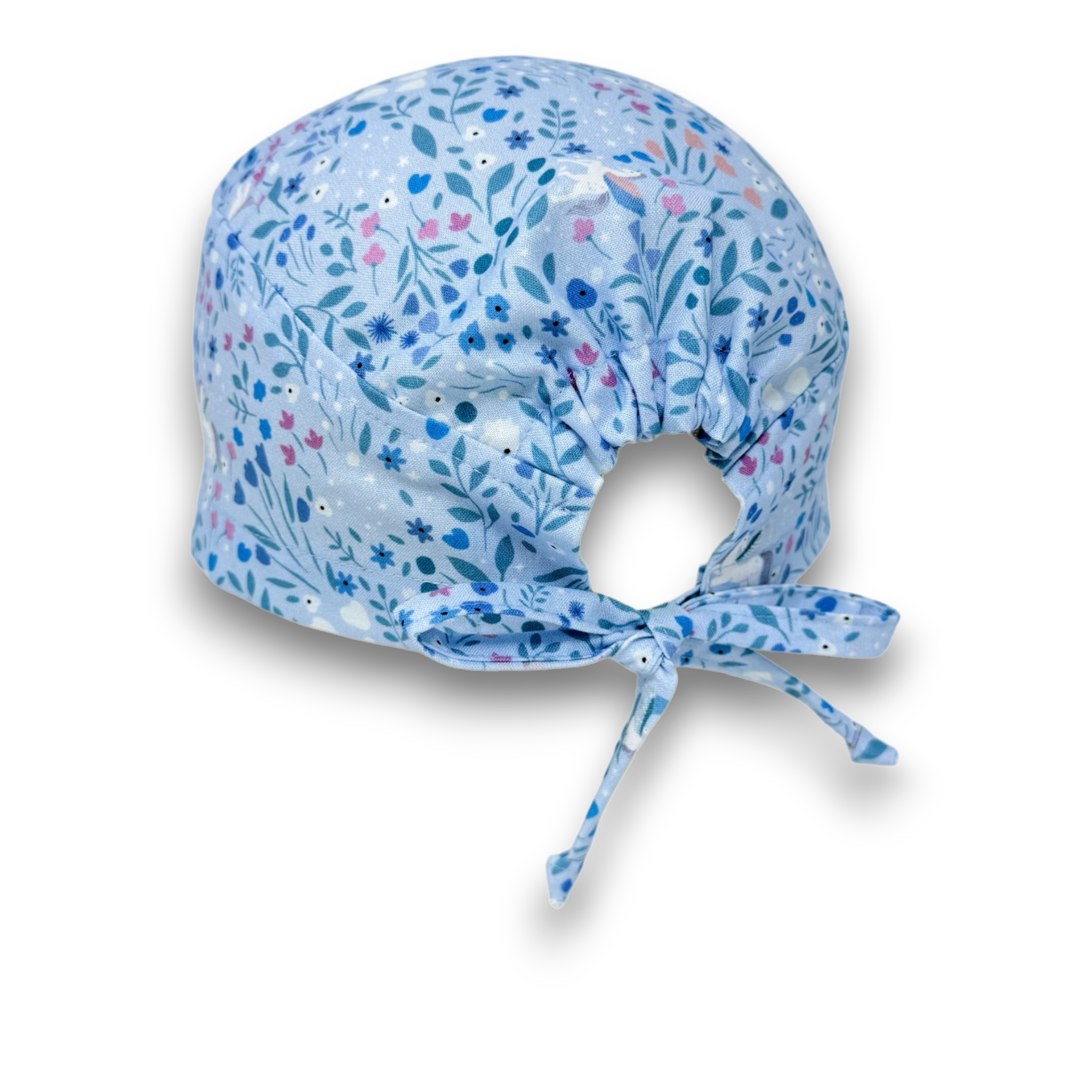 Surgical scrub cap. Unicorn skull tie-back style scrub cap by Paradise Caps. Light blue.
