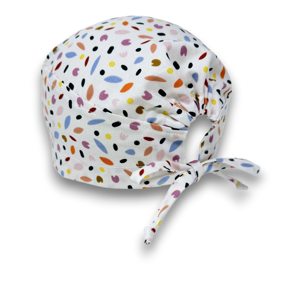 Spring Petals Skull tie-back style surgical scrub cap by Paradise Caps.