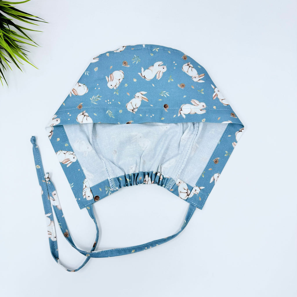 Sage Bunnies Skull tie-back style surgical scrub cap for men by Paradise Caps.