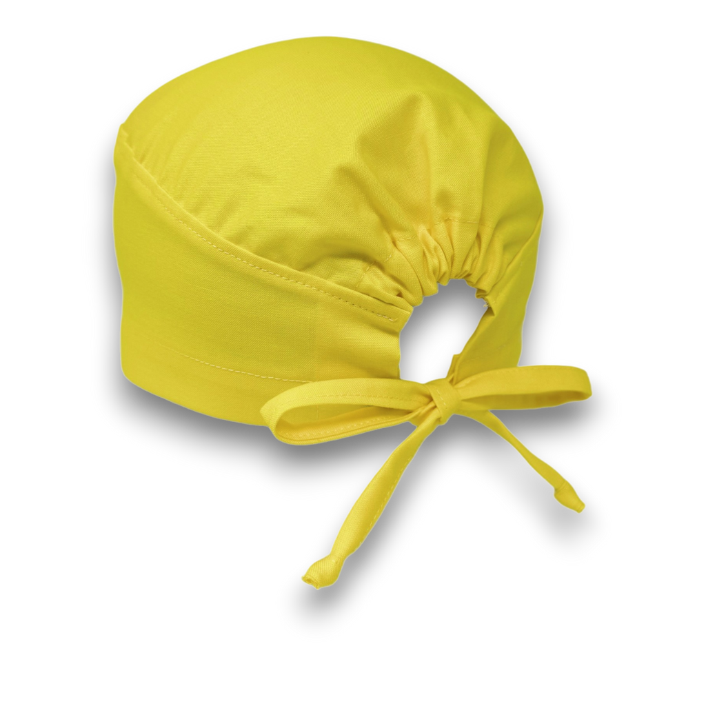 Solid yellow Skull tie-back style surgical scrub cap by Paradise Caps.