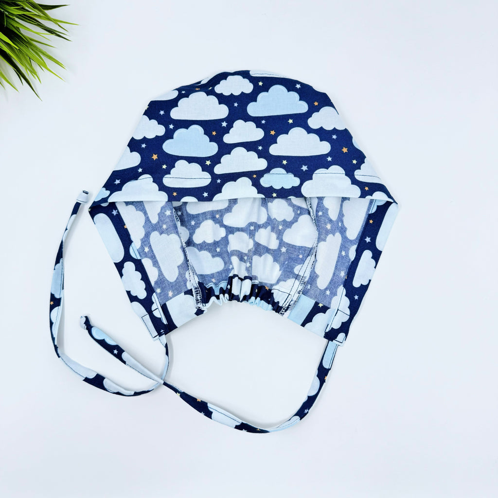 Clouds Skull tie-back style surgical scrub cap for men by Paradise Caps.