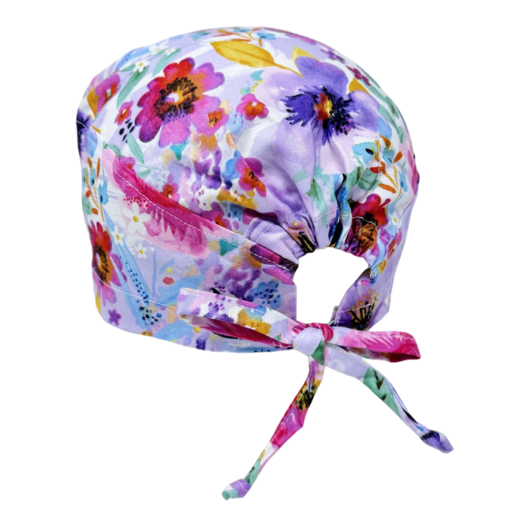 Purple flower Skull tie-back style surgical scrub cap by Paradise Caps.