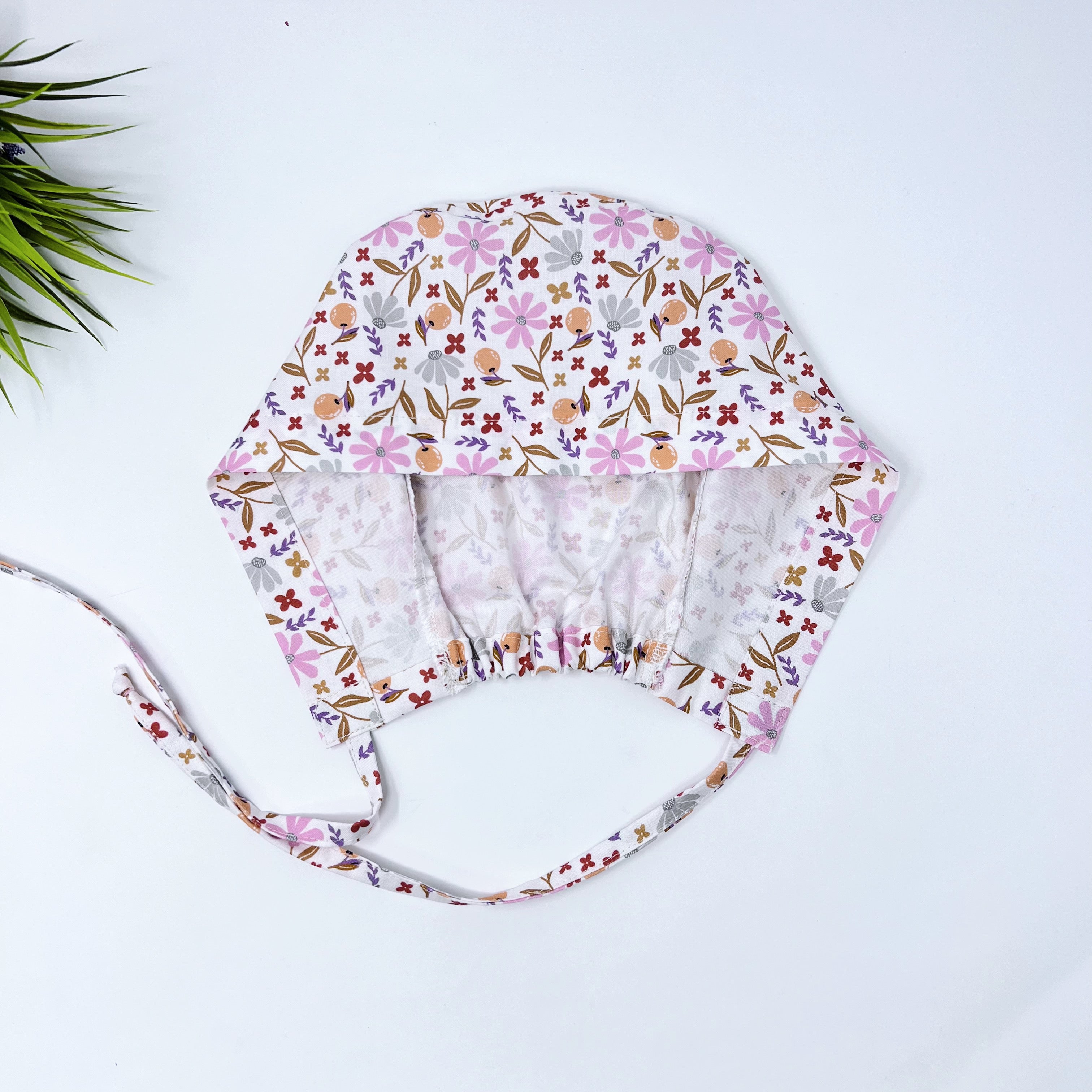 Colorful Blooming Skull tie-back style surgical scrub cap for men by Paradise Caps.