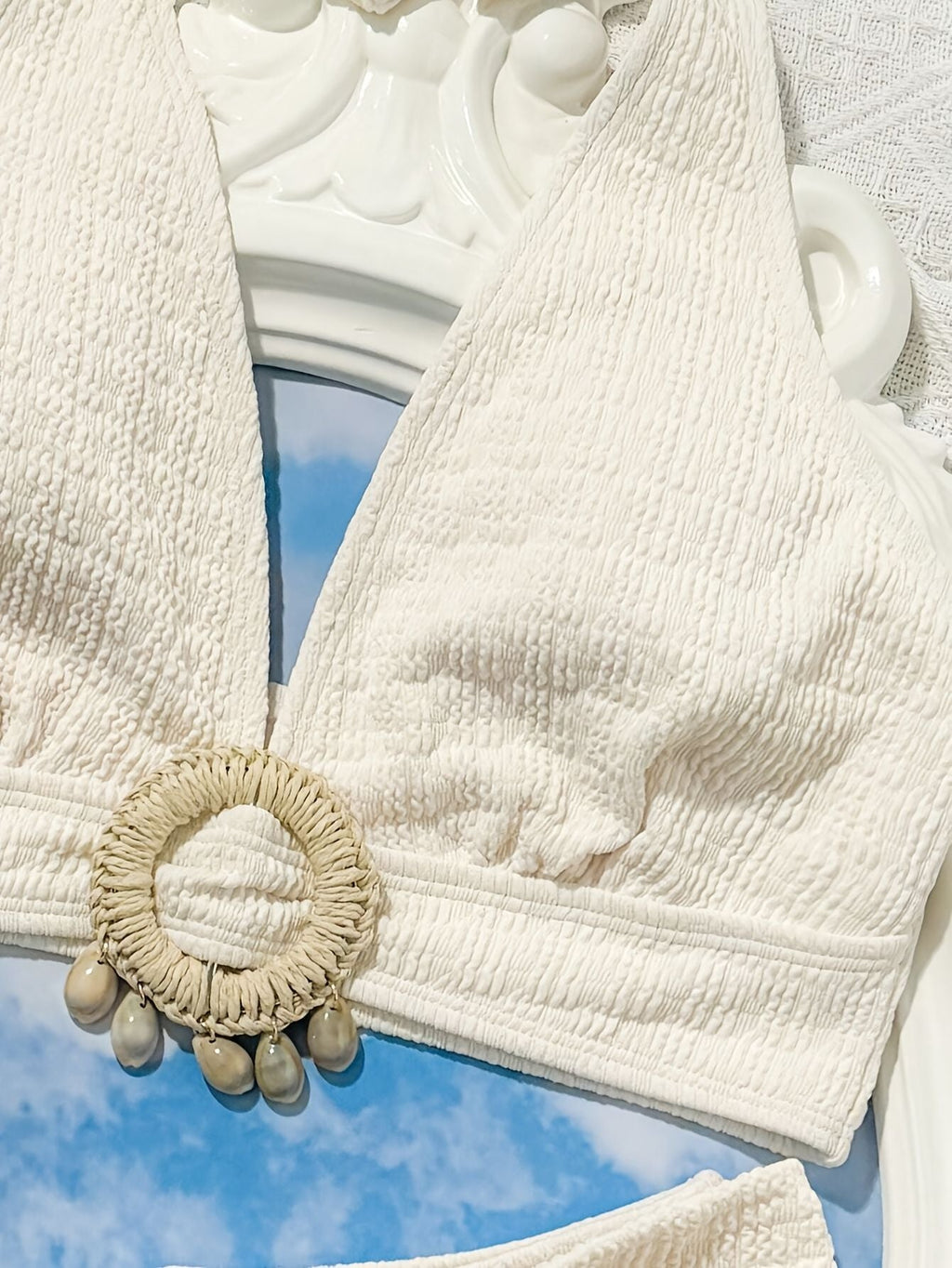 Ladies' white split beach bikini swimwear with shell embellishment, elegant and sexy