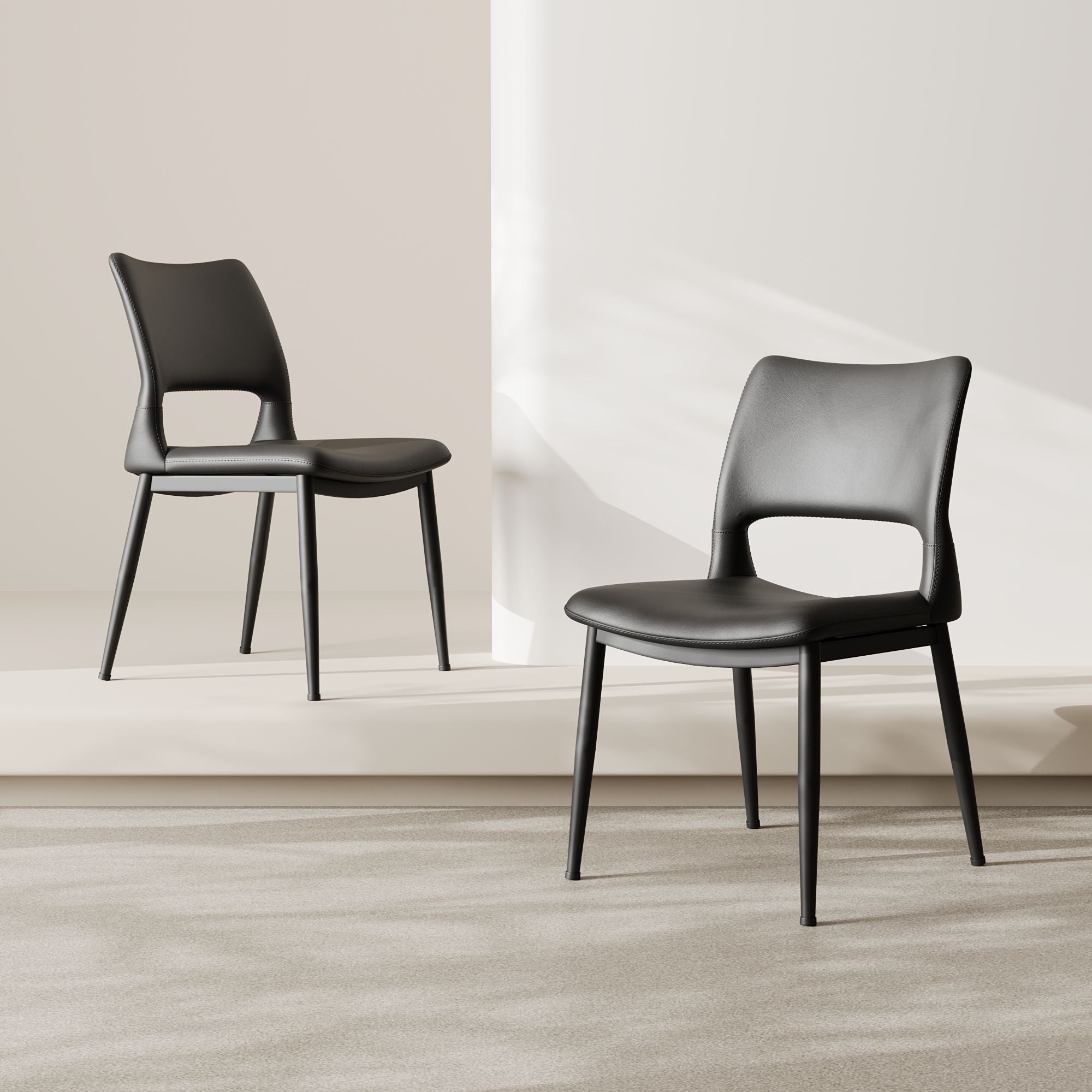 Modern minimalist black PU leather Dining Chairs Set of 2, comfortable backrest design, metal leg support, suitable for restaurants, kitchens, and offices.