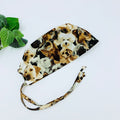Dogs Skull tie-back style surgical scrub cap for men by Paradise Caps.
