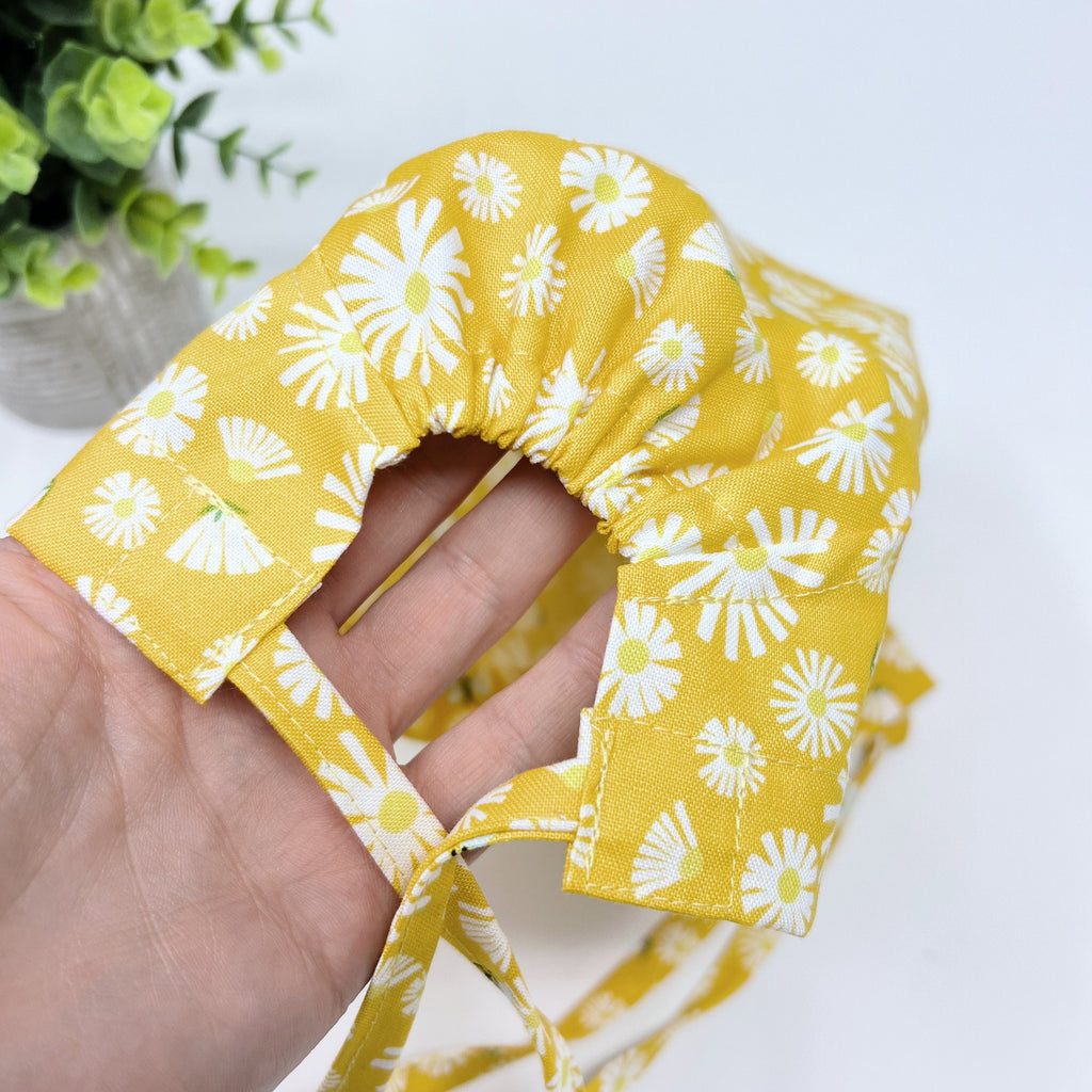 Yellow Flower Skull tie-back style surgical scrub cap for men by Paradise Caps.