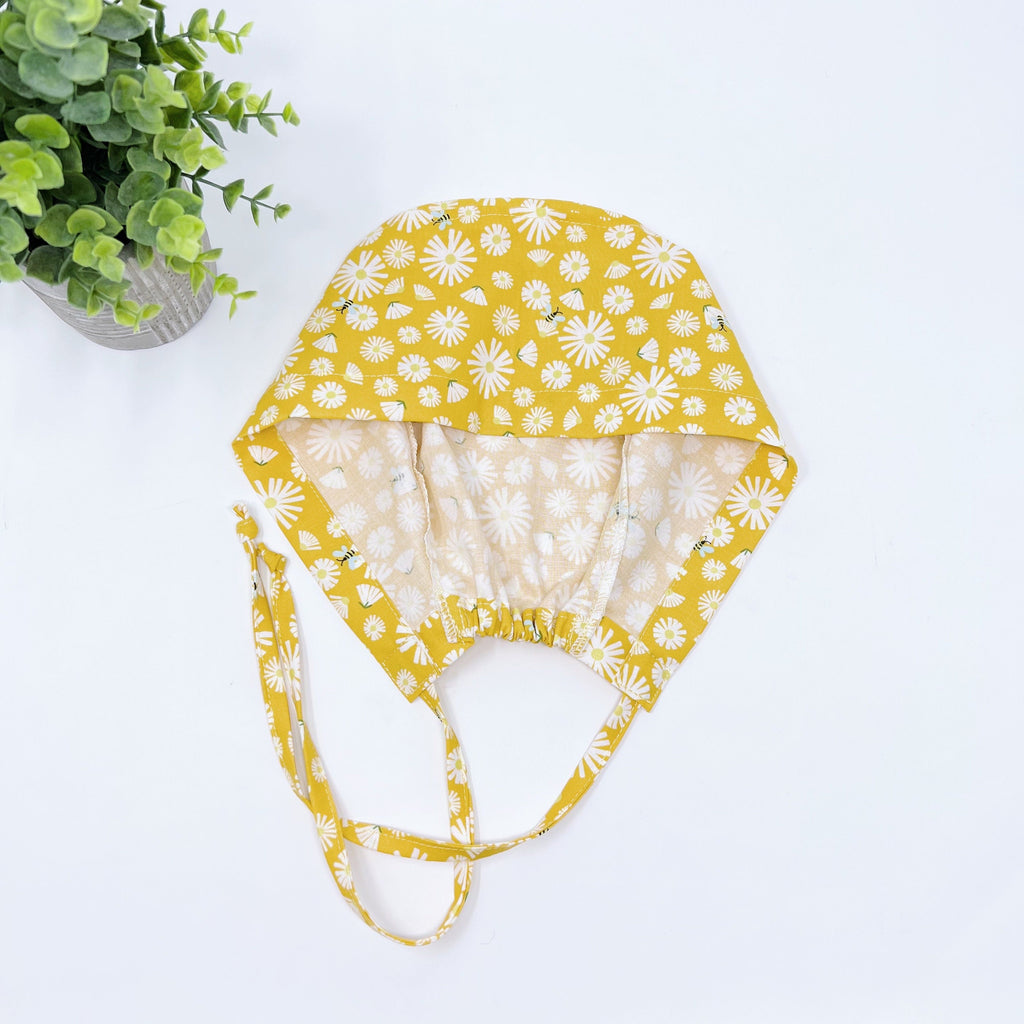 Yellow Flower Skull tie-back style surgical scrub cap for men by Paradise Caps.