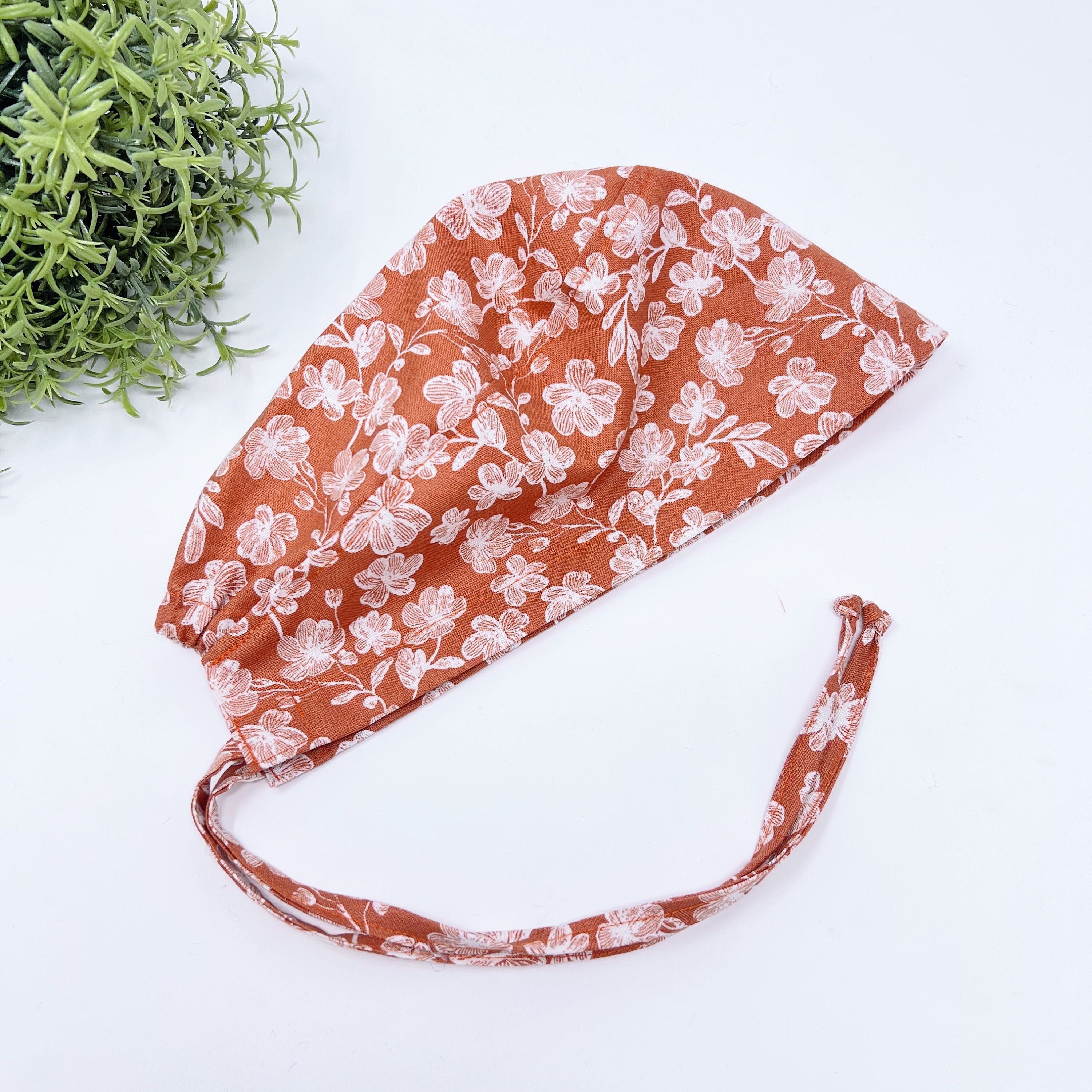 Floral Skull tie-back style surgical scrub cap for men by Paradise Caps.