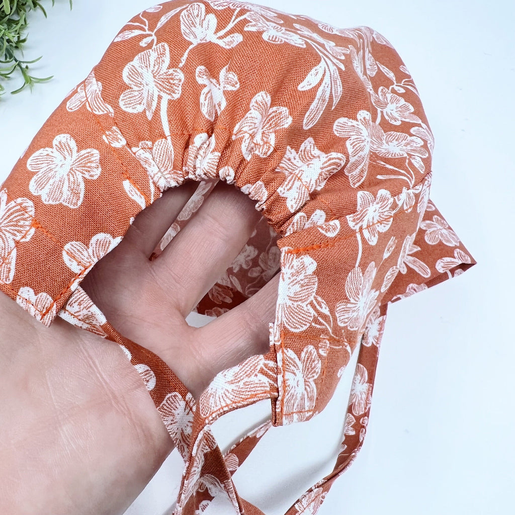 Floral Skull tie-back style surgical scrub cap for men by Paradise Caps.