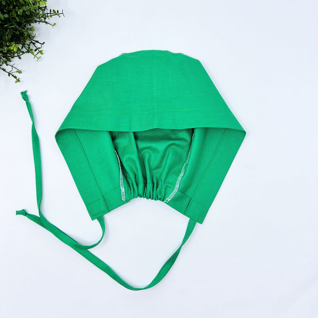 Solid green Skull tie-back style surgical scrub cap by Paradise Caps.