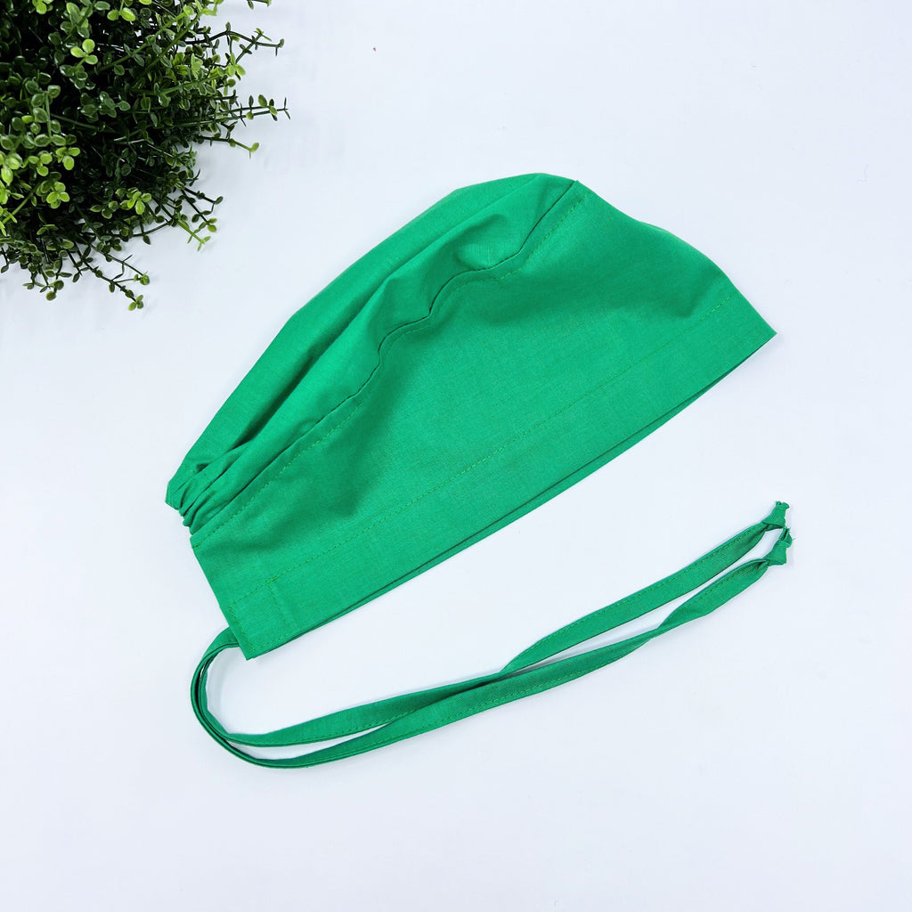 Solid green Skull tie-back style surgical scrub cap by Paradise Caps.