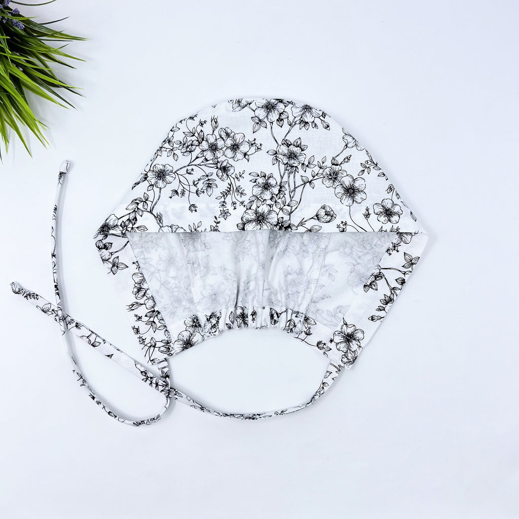 Flower Skull tie-back style surgical scrub cap by Paradise Caps.