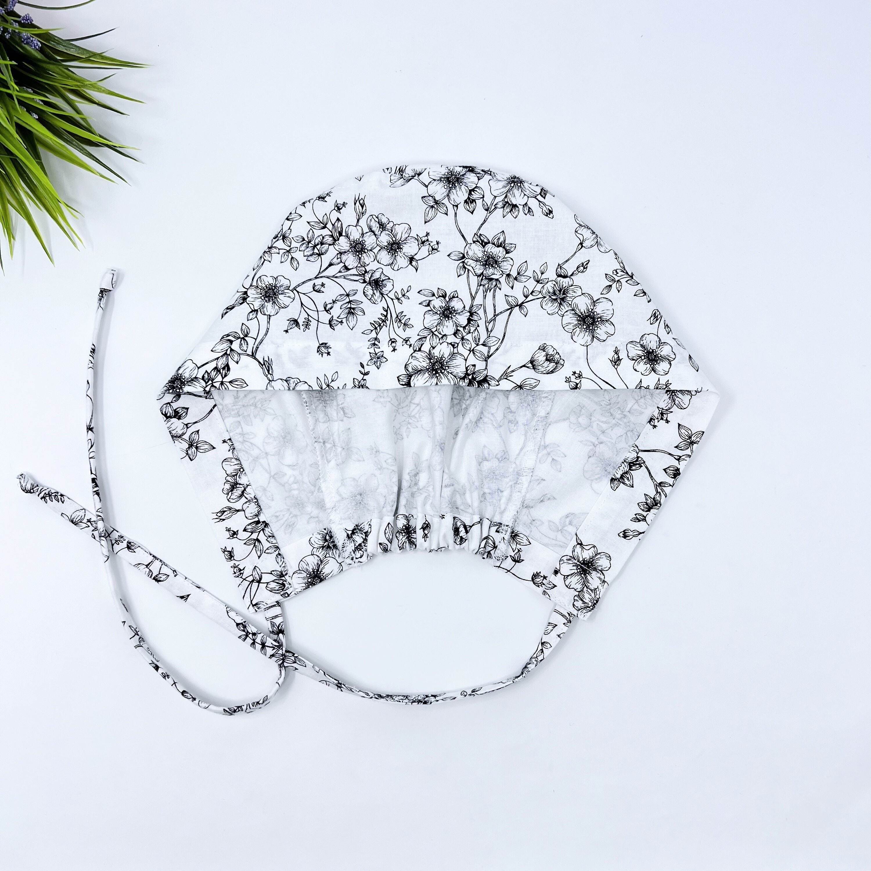 Flower Skull tie-back style surgical scrub cap by Paradise Caps.