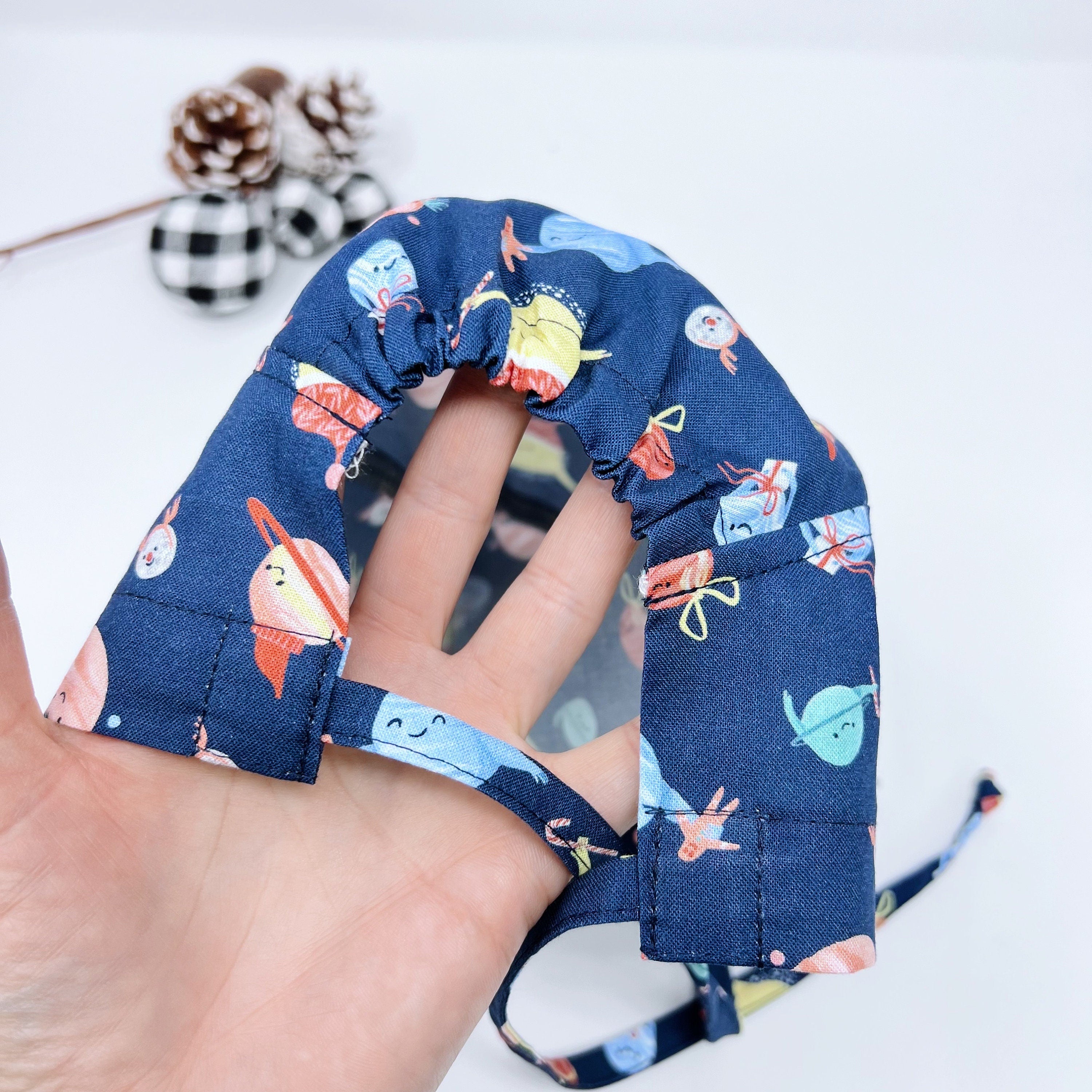 Holiday planet Skull tie-back style surgical scrub cap by Paradise Caps.