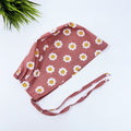 Floral Skull tie-back style surgical scrub cap for men by Paradise Caps.