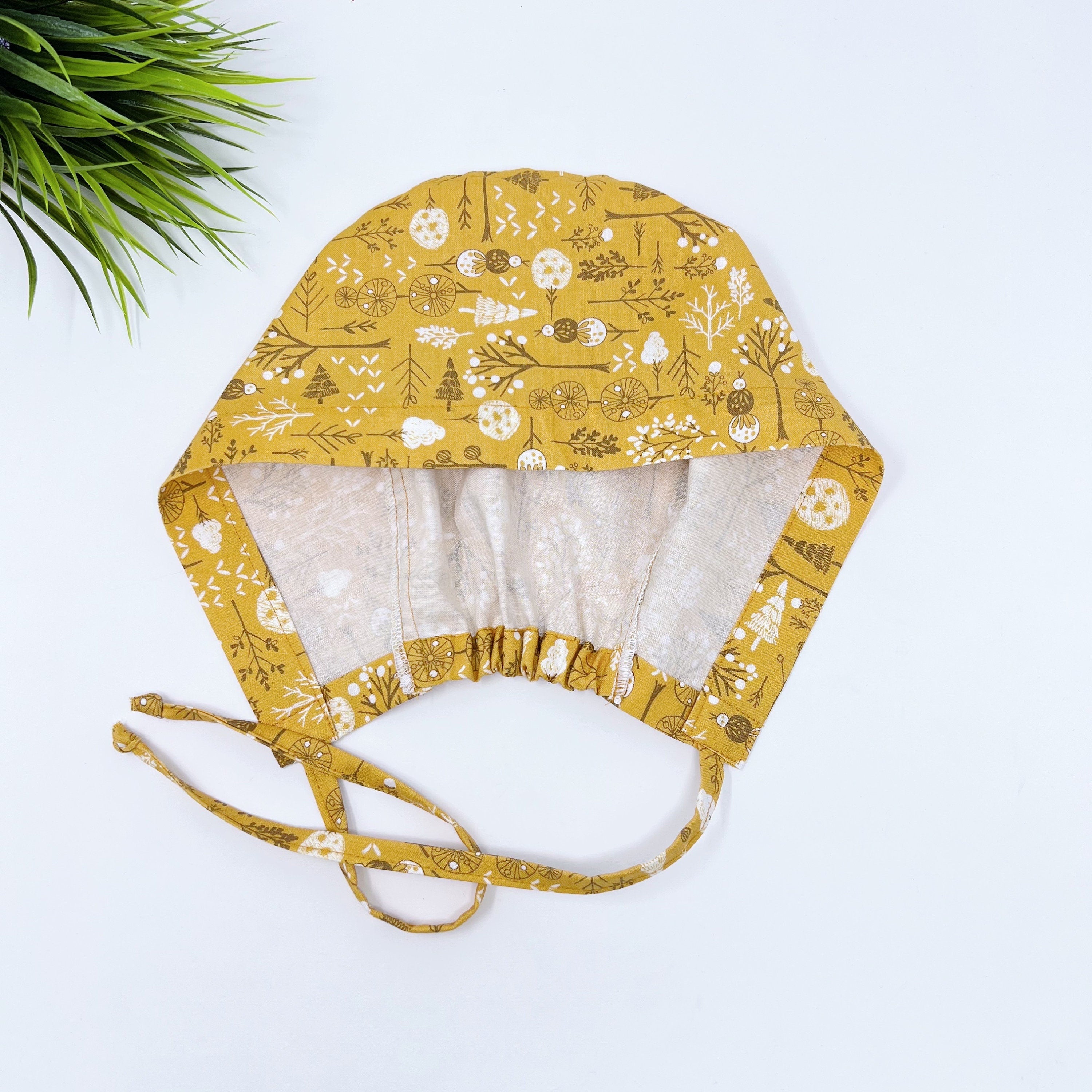 Floral winter Skull tie-back style surgical scrub cap by Paradise Caps.
