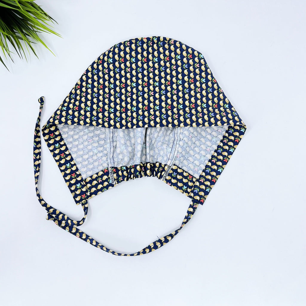 Birds Skull tie-back style surgical scrub cap by Paradise Caps.