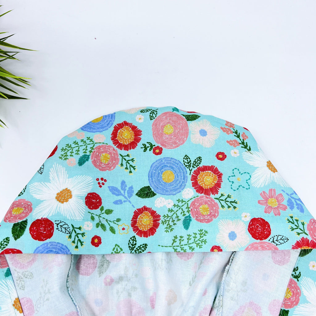 Green floral Skull tie-back style surgical scrub cap for men by Paradise Caps.