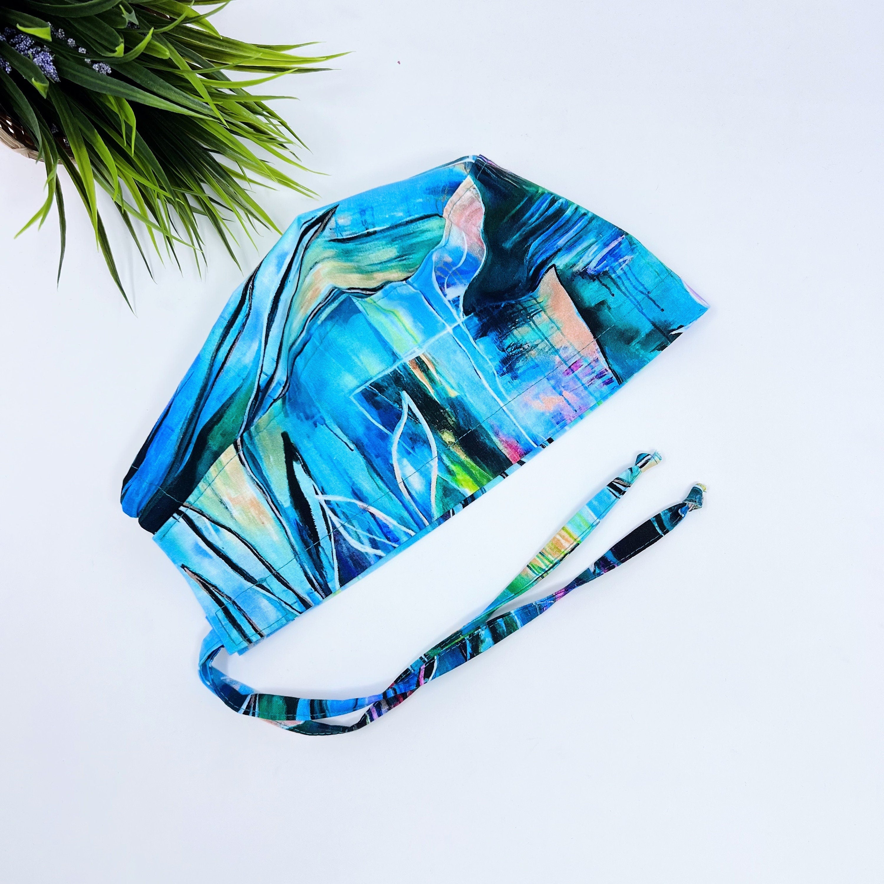 Large Floral Leaves Skull tie-back style surgical scrub cap for men by Paradise Caps.