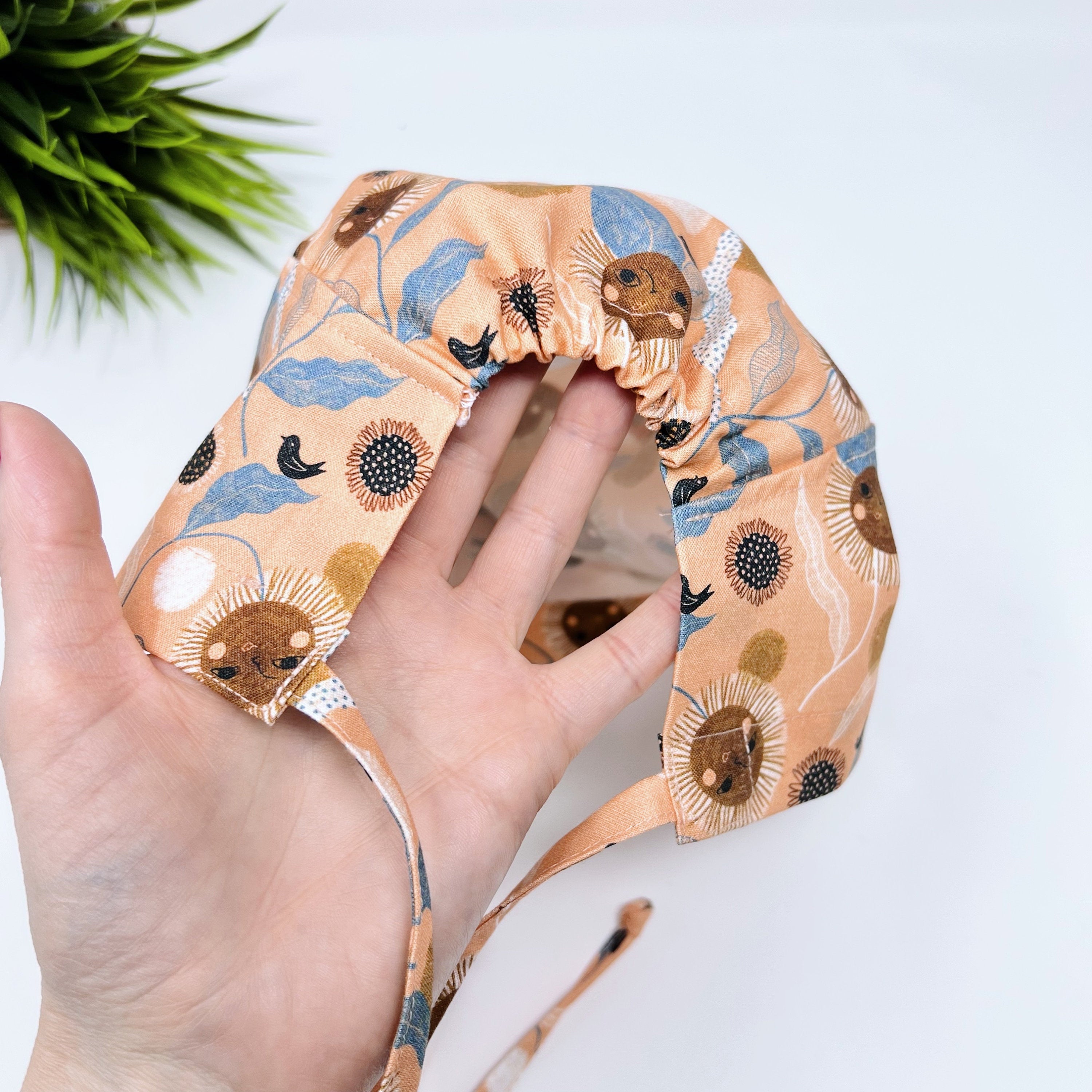 Floral Twirl Skull tie-back style surgical scrub cap for men by Paradise Caps.