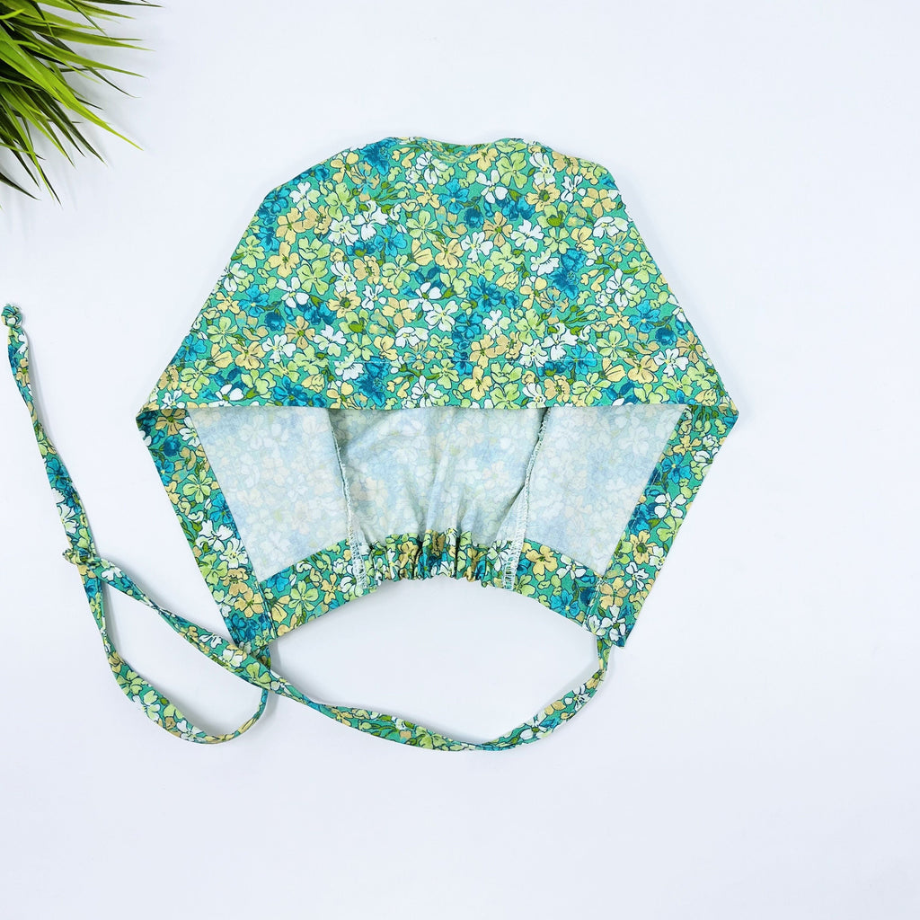 Aqua Flora Skull tie-back style surgical scrub cap for men by Paradise Caps.