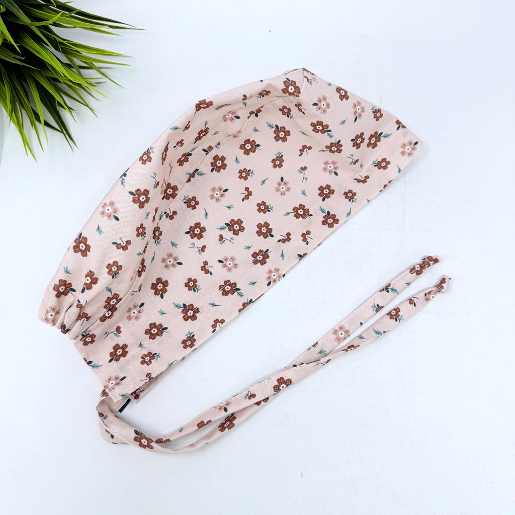 Peach Flower Skull tie-back style surgical scrub cap for men by Paradise Caps.