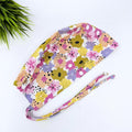 Colorful Flower Skull tie-back style surgical scrub cap for men by Paradise Caps.
