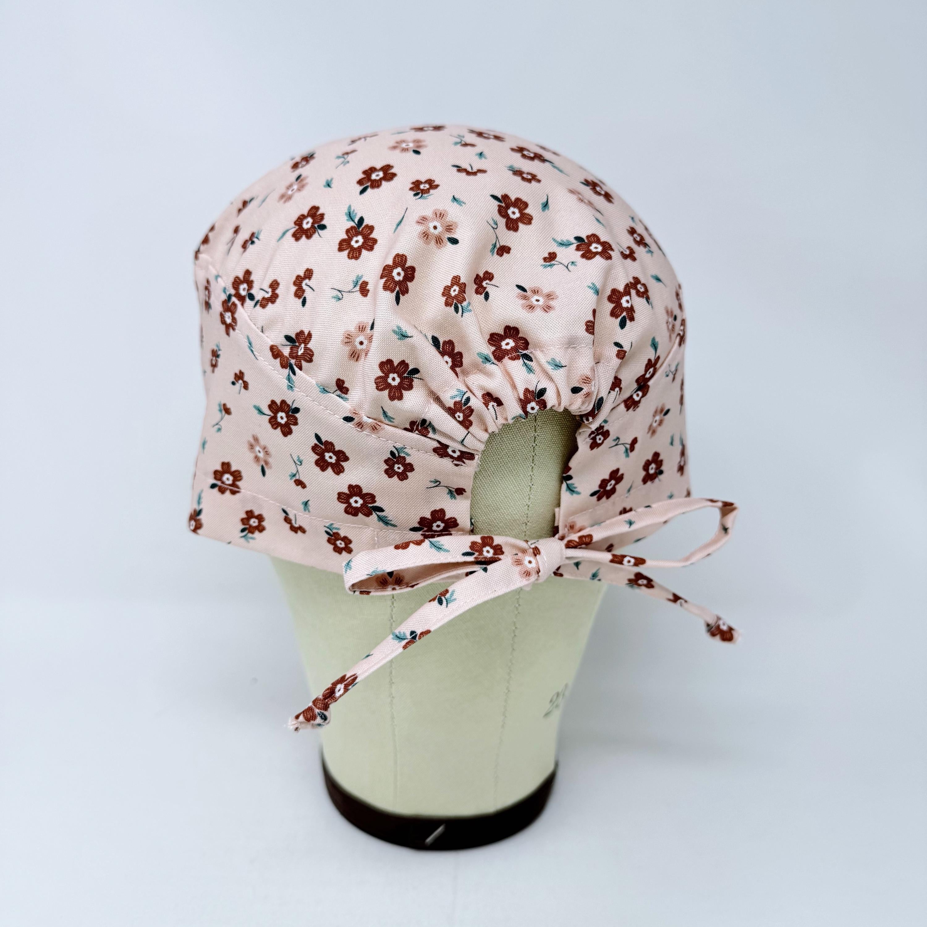 Peach Flower Skull tie-back style surgical scrub cap for men by Paradise Caps.