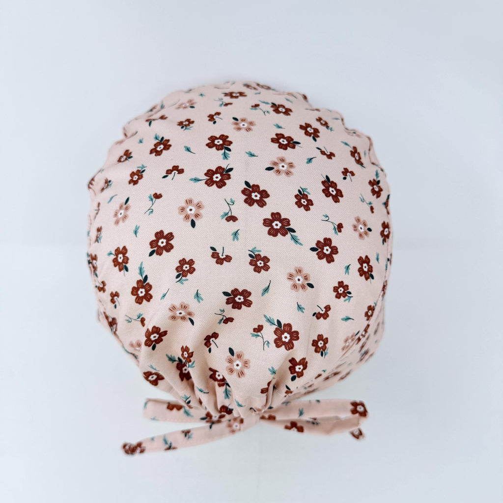 Peach Flower Skull tie-back style surgical scrub cap for men by Paradise Caps.