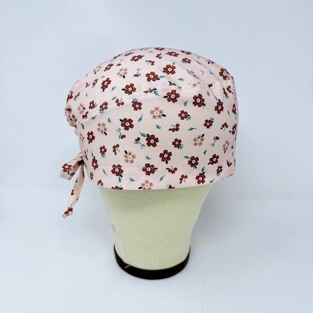 Peach Flower Skull tie-back style surgical scrub cap for men by Paradise Caps.